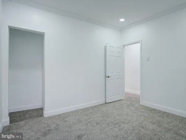 a bed room with a bed and a couch