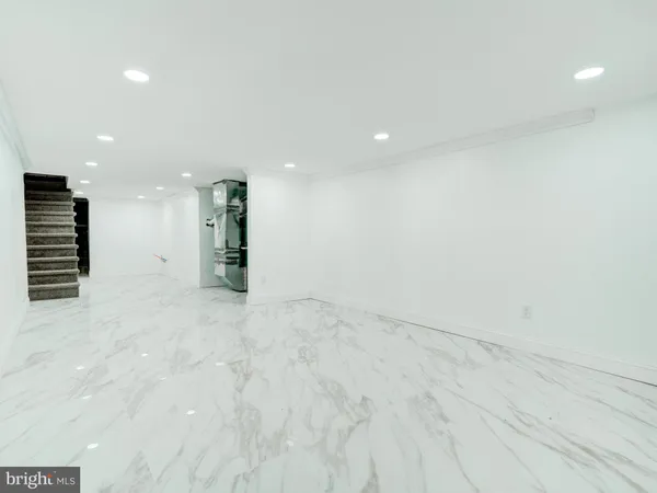 a bathroom with a toilet sink and bathtub