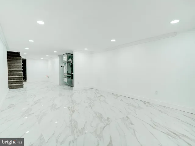 a bathroom with a toilet sink and bathtub