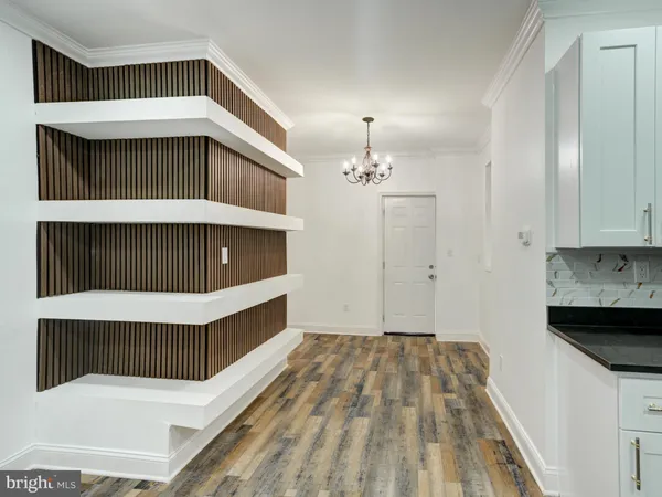 a bathroom with a double vanity sink and mirror