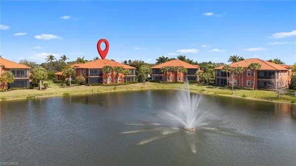 a view of a lake with houses