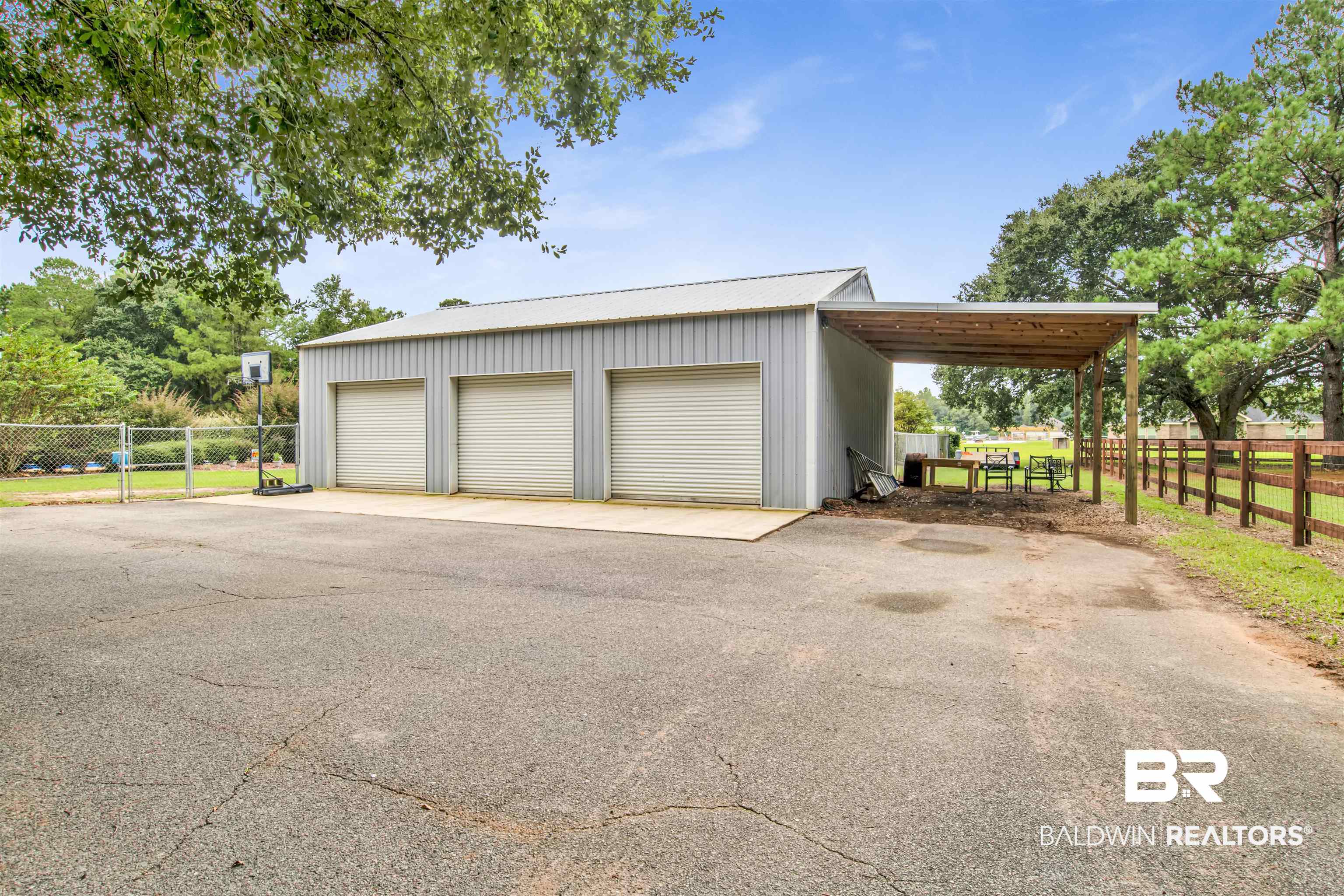 13385 Tom Gaston Road Mobile, AL 36695 - Photo 31 of 42 Garage with a carport