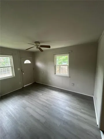 an empty room with windows