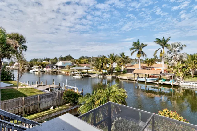 a view of a lake with a house