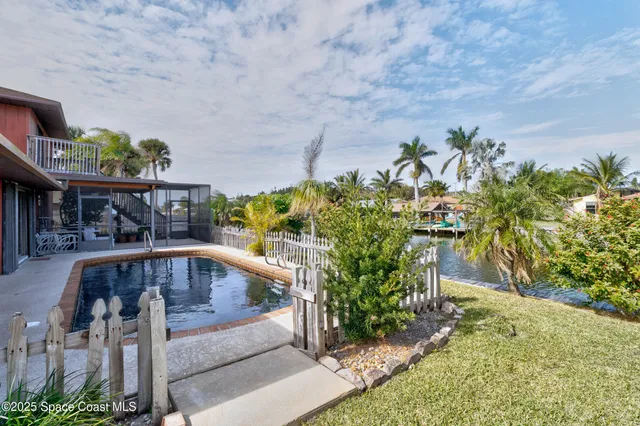 a house with river in front of it