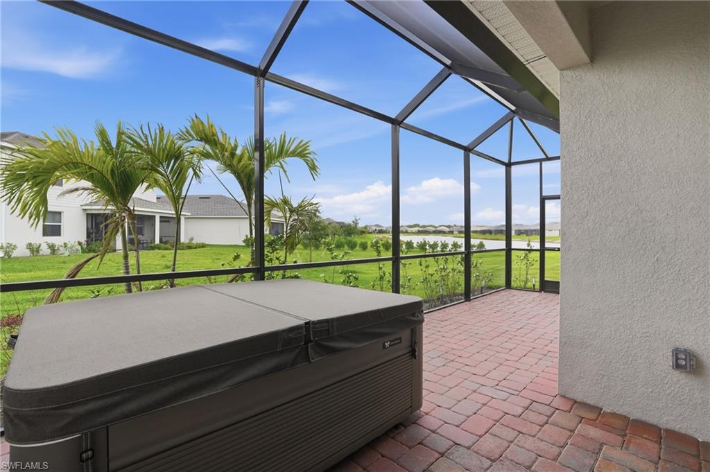 2215 Dragonfruit Way Naples, FL 34120 - Photo 33 of 38 a view of swimming pool with a yard