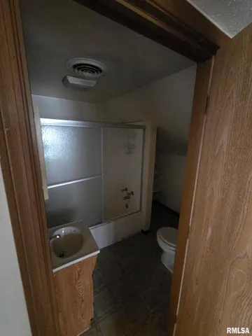 a bathroom with a toilet