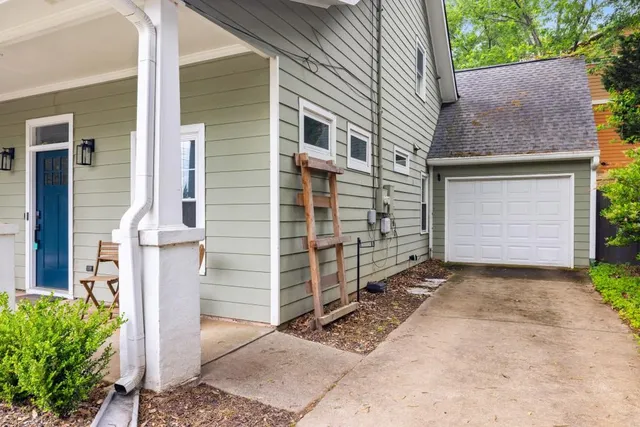 a front view of a house with a garage