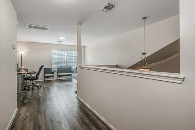 a view of a backyard with sitting area