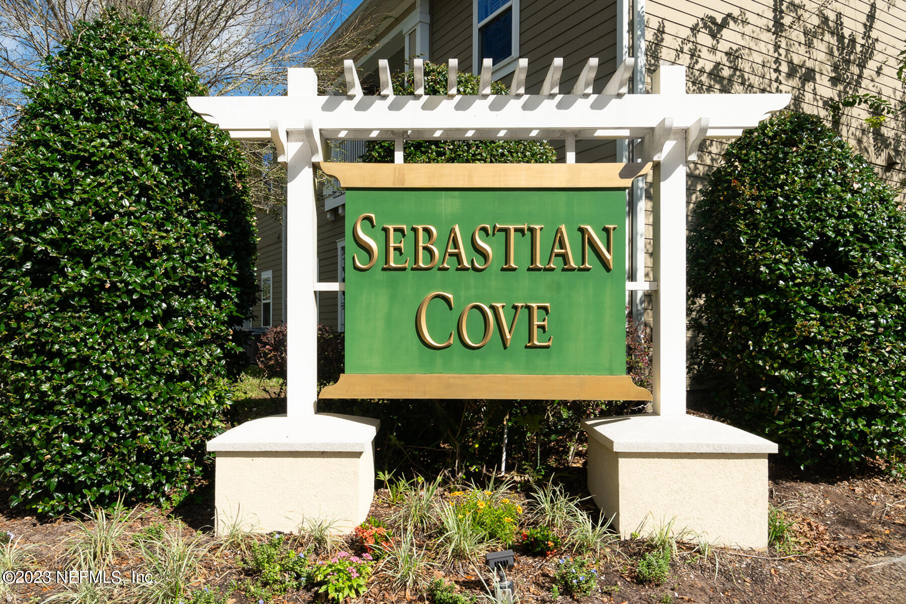 303 Golden Lake Loop St. Augustine, FL 32084 - Photo 32 of 38 a sign on the side of a building