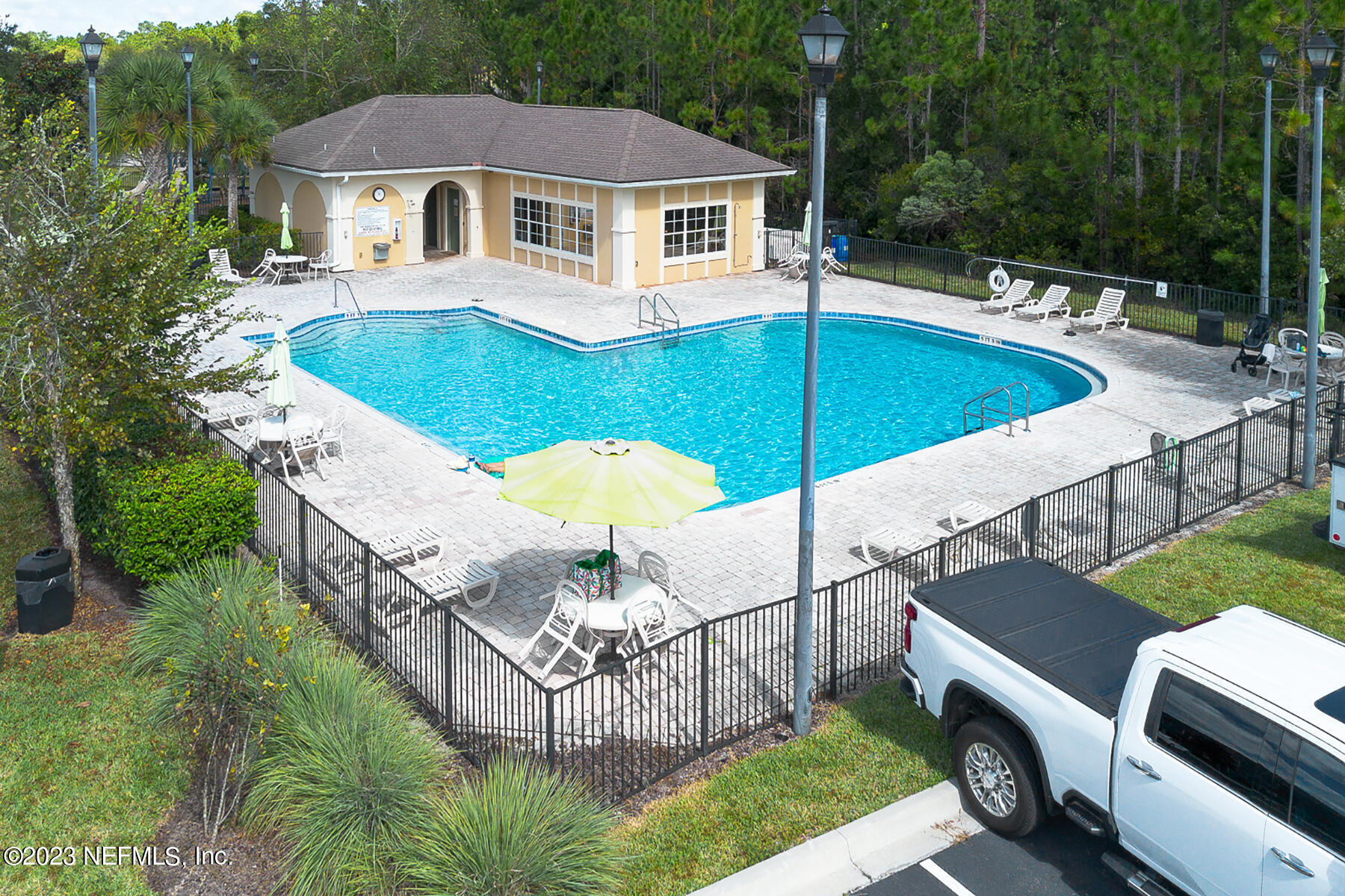 303 Golden Lake Loop St. Augustine, FL 32084 - Photo 36 of 38 a view of a house with backyard and sitting area