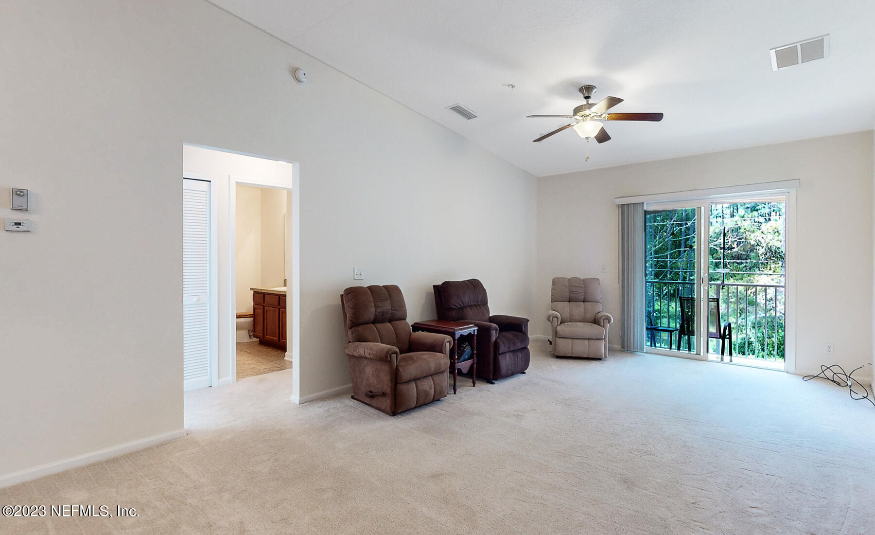 303 Golden Lake Loop St. Augustine, FL 32084 - Photo 5 of 38 a view of livingroom with furniture and chandelier