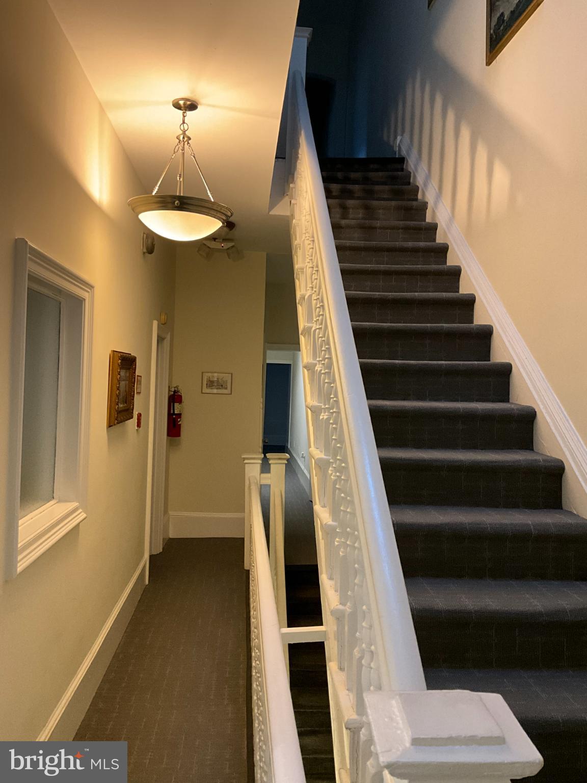 1230 17th Street Northwest Washington, DC 20036 - Photo 7 of 12 a view of entryway and hall with wooden floor