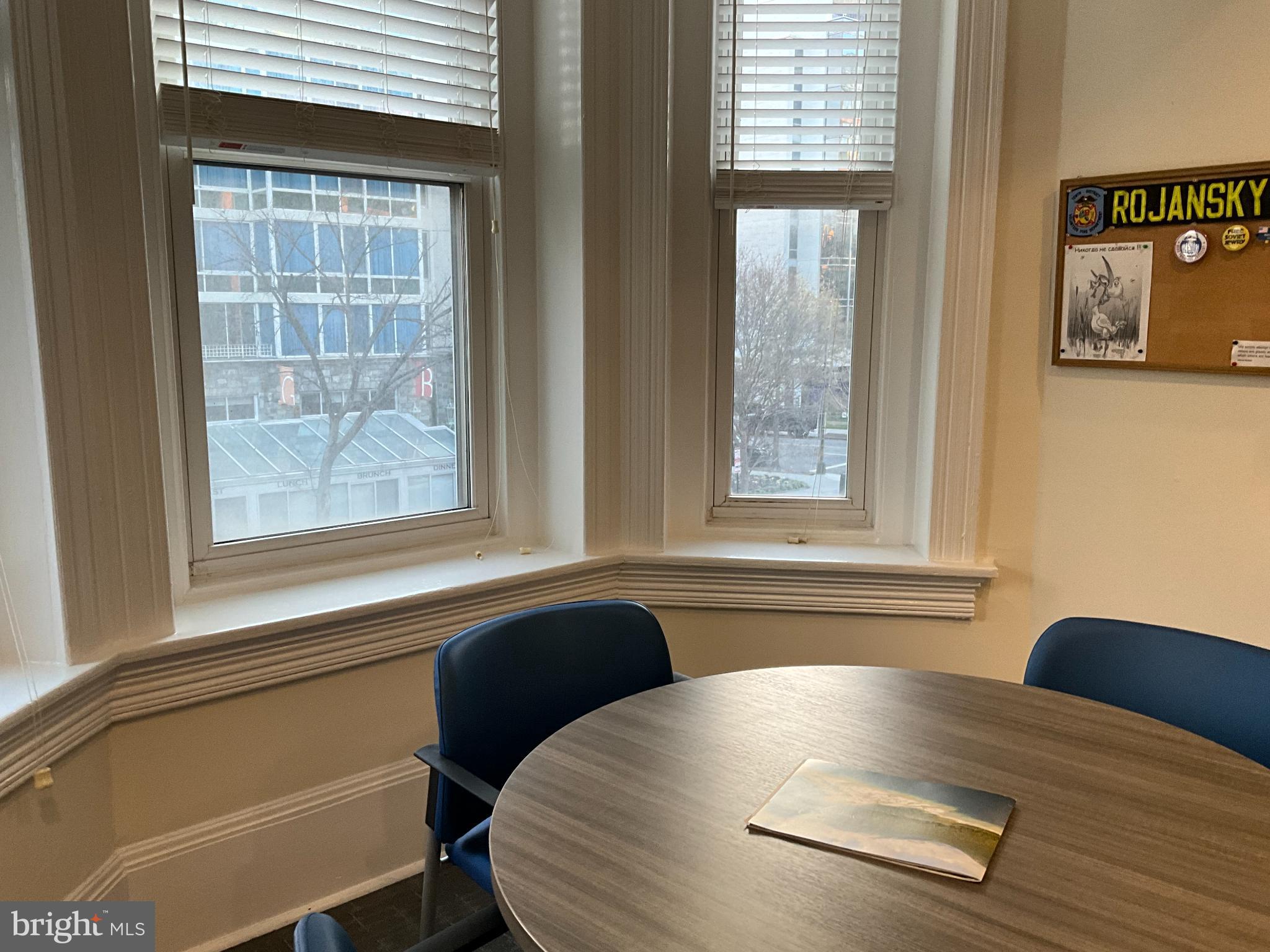 1230 17th Street Northwest Washington, DC 20036 - Photo 10 of 12 a view of a window and chair in a room