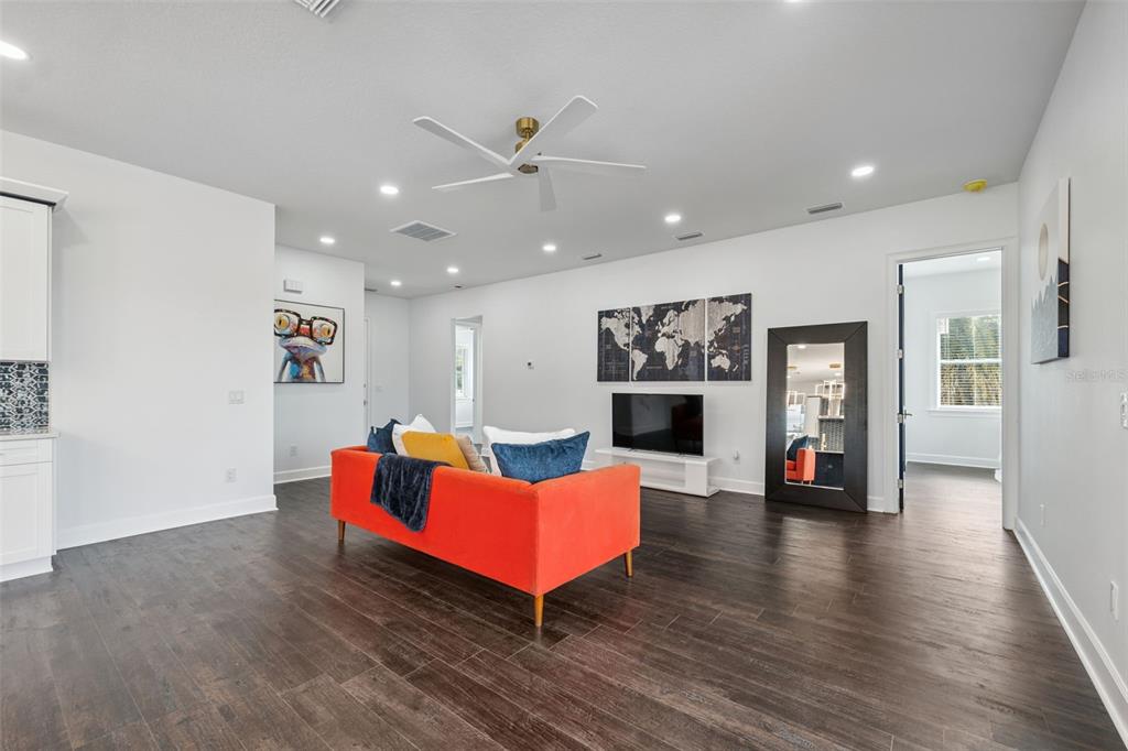 8605 Inwood Drive Hudson, FL 34667 - Photo 20 of 65 a living room with furniture and wooden floor