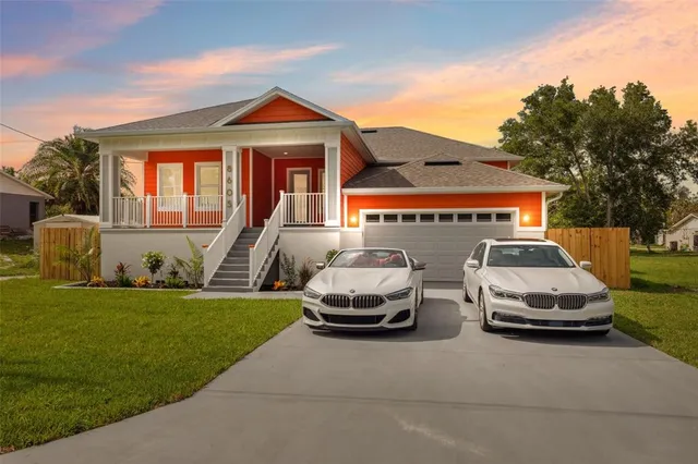 a car parked in front of a house