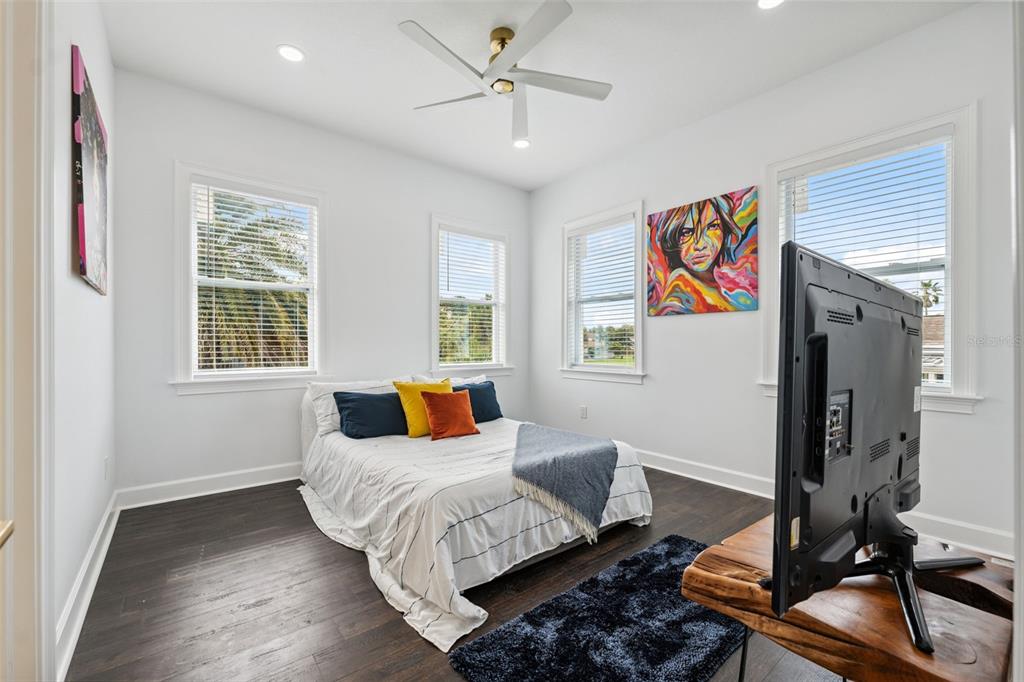 8605 Inwood Drive Hudson, FL 34667 - Photo 26 of 65 a bedroom with furniture and a window