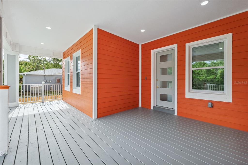 8605 Inwood Drive Hudson, FL 34667 - Photo 4 of 65 a view of backyard with a deck and wooden floor