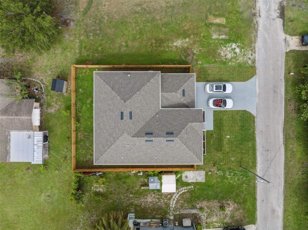 8605 Inwood Drive Hudson, FL 34667 - Photo 50 of 65 aerial view of a house with a yard