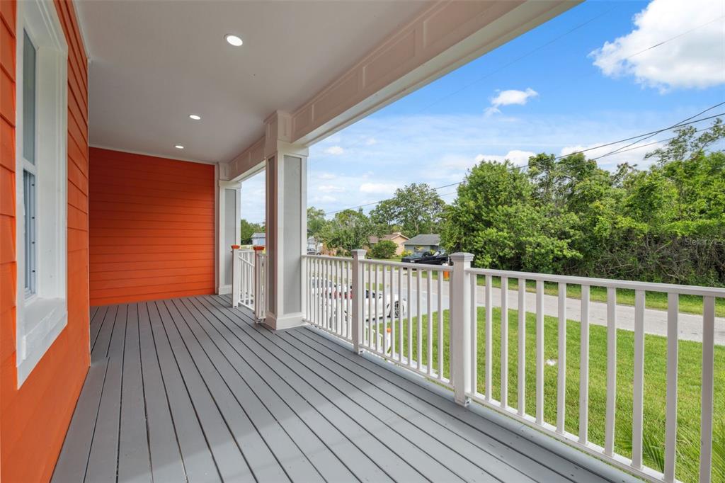 8605 Inwood Drive Hudson, FL 34667 - Photo 5 of 65 a view of balcony with wooden floor