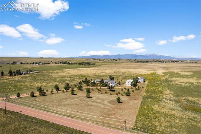 1150 Slocum Road Colorado Springs, CO 80930 - Photo 22 of 30 Drone / aerial view with a rural view and a mountain view