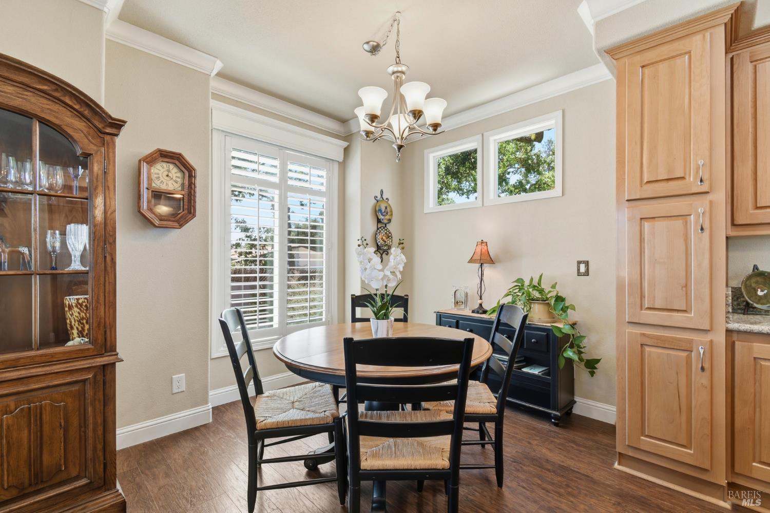 120 Shamrock Circle Santa Rosa, CA 95403 - Photo 4 of 45 a dining room with furniture potted plants and wooden floor