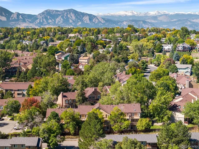 a view of a city with a mountain
