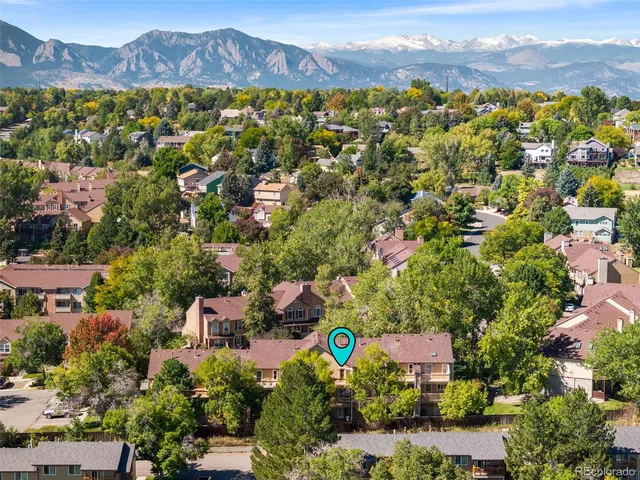 a view of a city with a lake