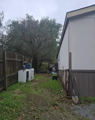 a view of a backyard with garden