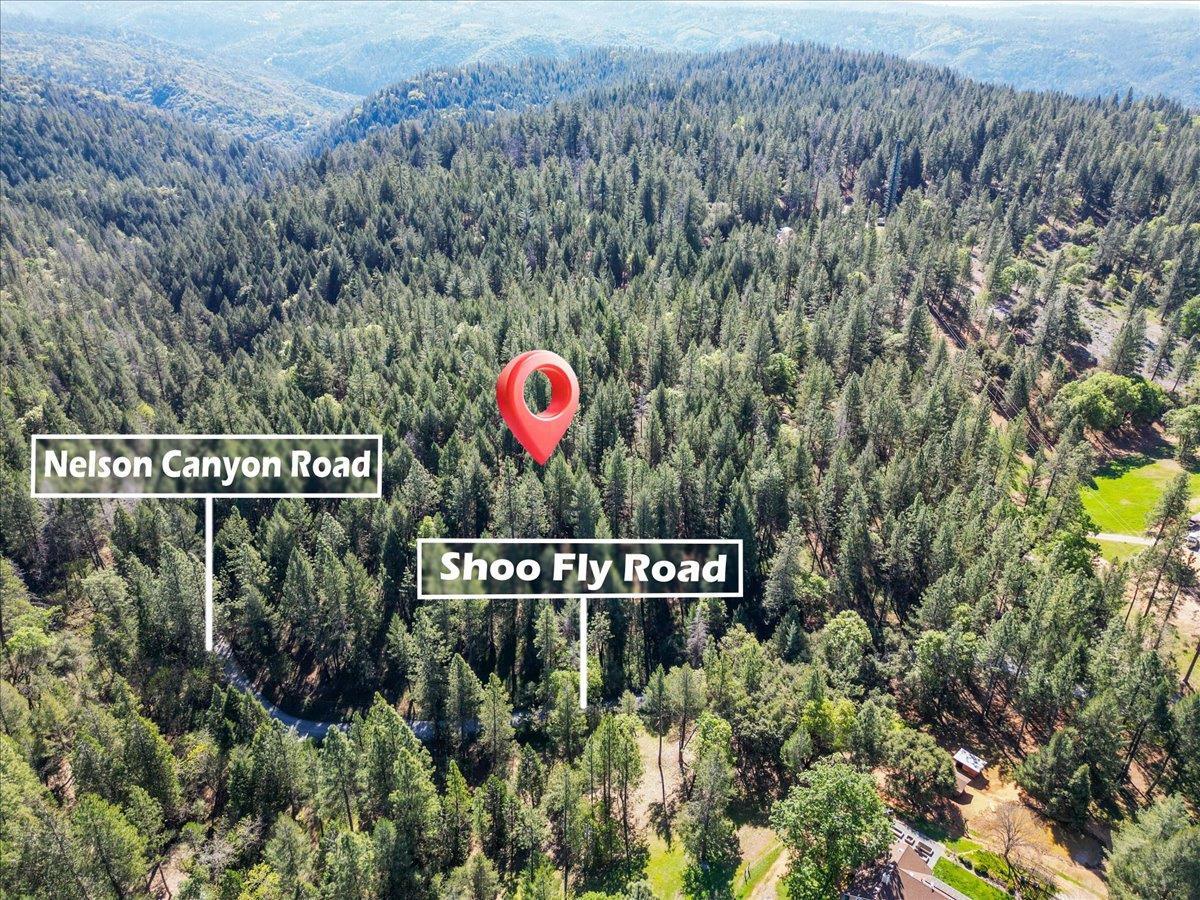 6400 Shoo Fly Road Placerville, CA 95667 - Photo 8 of 18 a sign that is sitting on a wooden wall