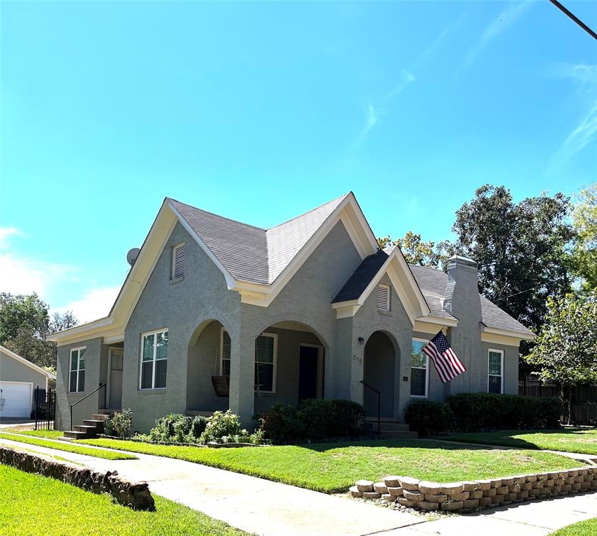 206 West Shaw Street Tyler, TX 75701 - Photo 1 of 1 a front view of a house with a yard