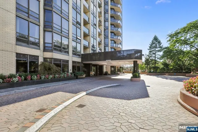 a front view of building with street