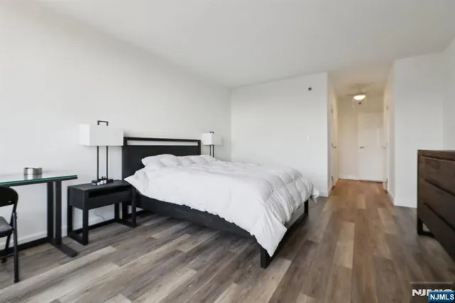 a bathroom with a double vanity sink and mirror