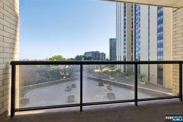 a view of a city with tall buildings