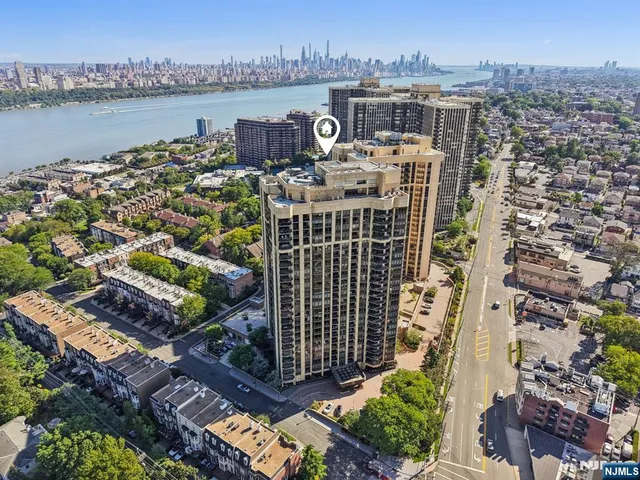 a view of a city with ocean view