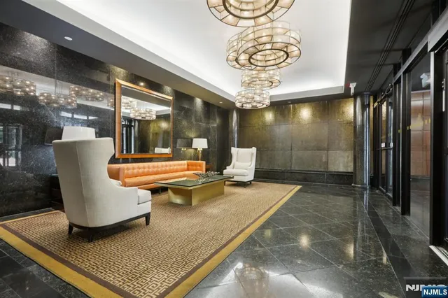 a view of swimming pool with a table and chairs