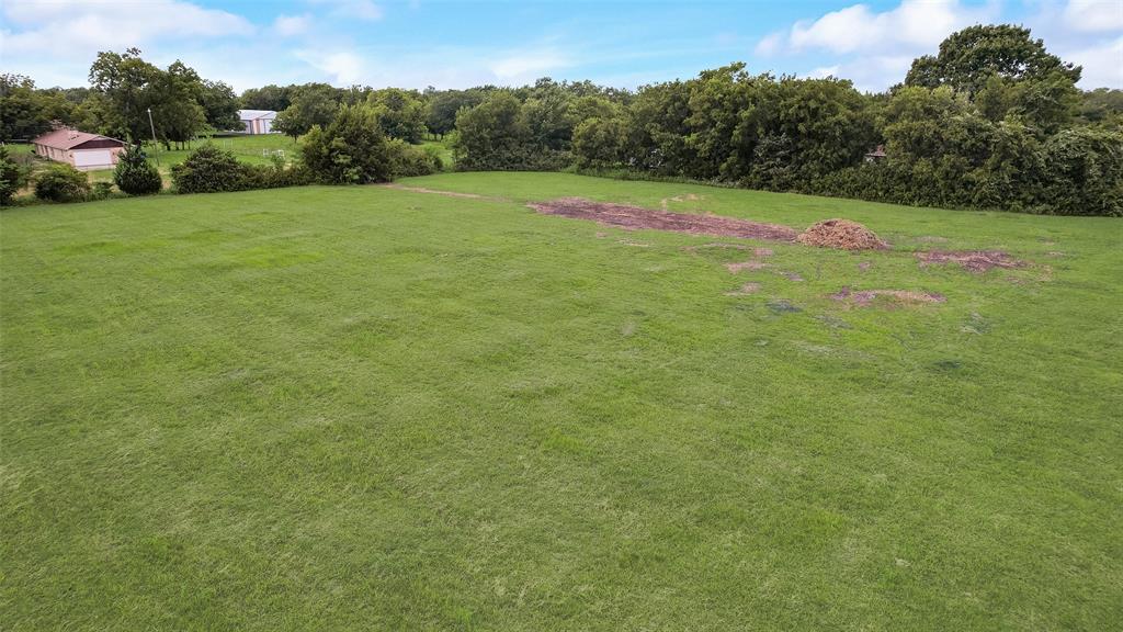 0 Fm 740 Road Forney, TX 75126 - Photo 7 of 8 a view of a green field with clear sky