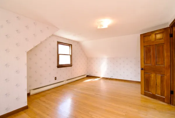 a view of an empty room with window