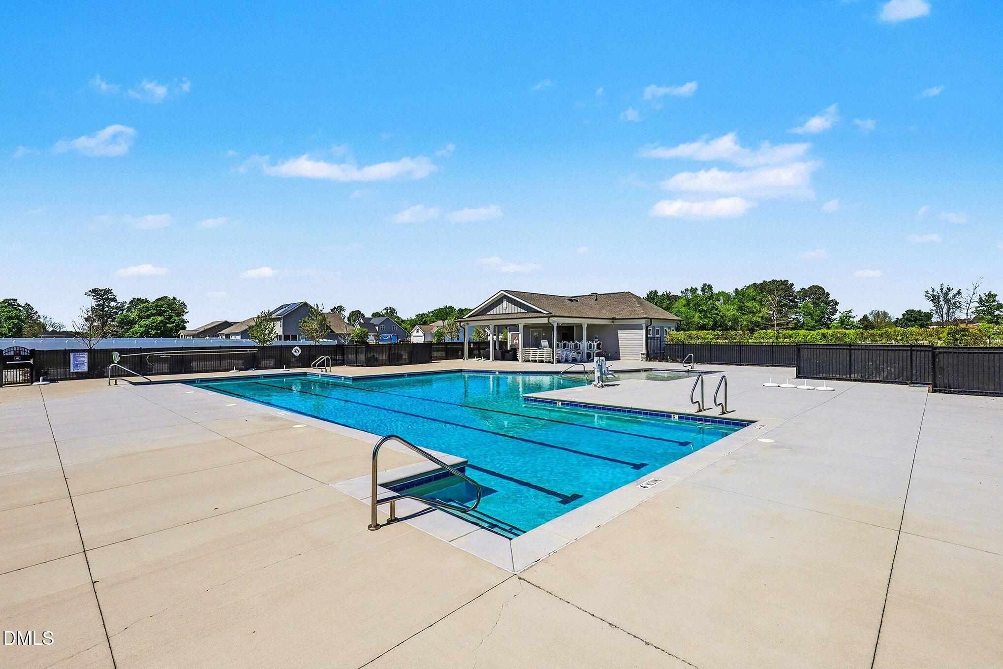 90 Rigsby Avenue Four Oaks, NC 27524 - Photo 34 of 43 a view of swimming pool with a yard