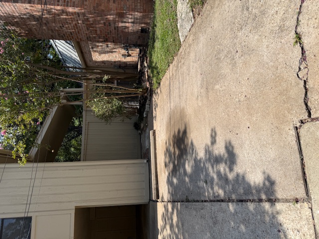 1401 West 29th Street, Unit C Austin, TX 78703 - Photo 16 of 19 a view of a house with a yard