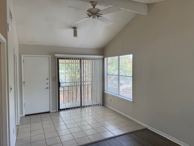 1401 West 29th Street, Unit C Austin, TX 78703 - Photo 2 of 19 an empty room with windows and fan