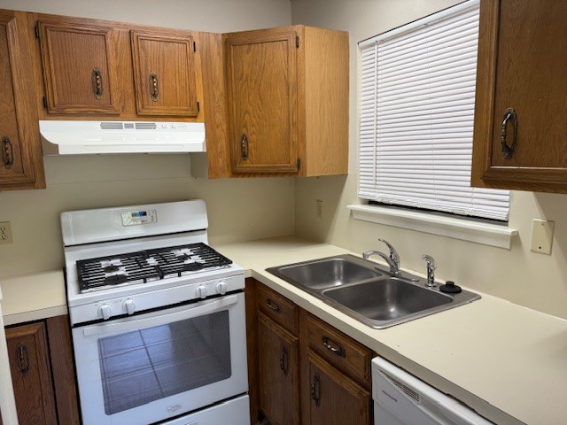 1401 West 29th Street, Unit C Austin, TX 78703 - Photo 4 of 19 a kitchen with granite countertop a sink a stove and cabinets