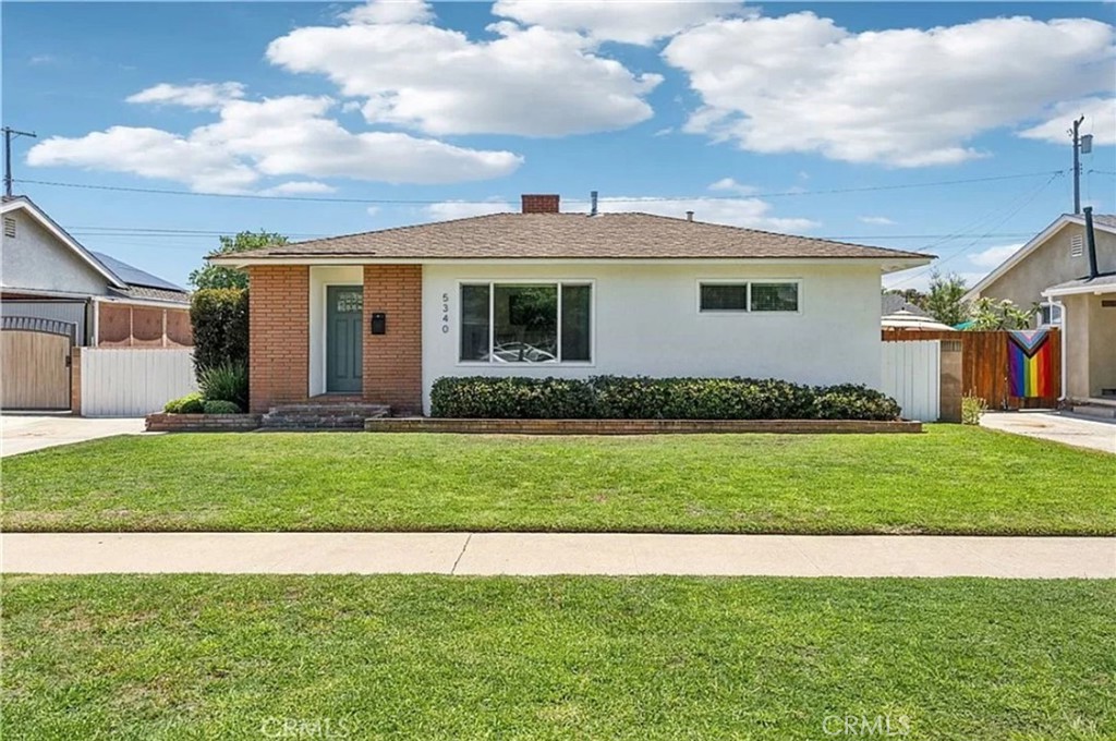 5340 East Mezzanine Way Long Beach, CA 90808 - Photo 1 of 18 a front view of house with yard
