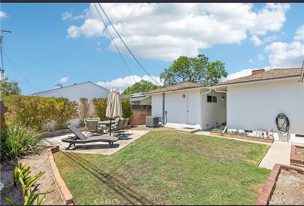 5340 East Mezzanine Way Long Beach, CA 90808 - Photo 16 of 18 a view of a swimming pool with chairs
