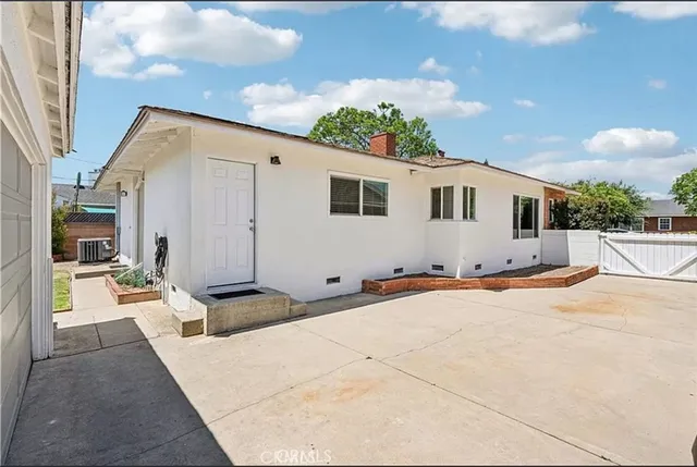 a view of a house with a patio