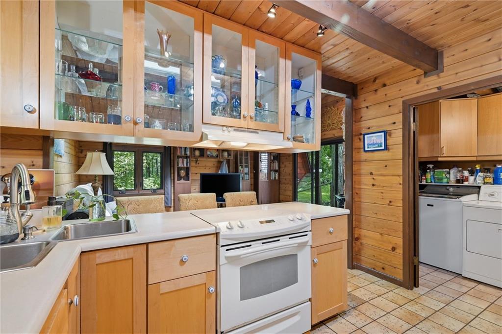 6110 Saltsburg Road Murrysville, PA 15668 - Photo 11 of 47 a kitchen with a stove oven and a sink