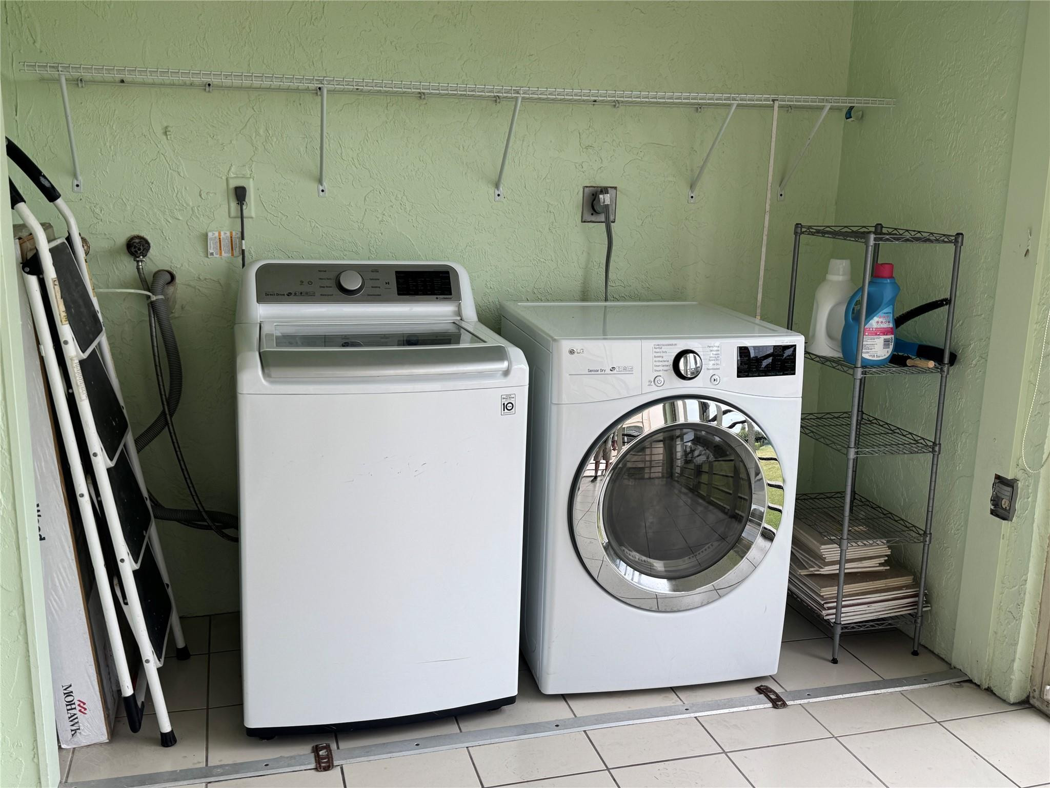 9300 Southwest 8th Street, Unit 215 Boca Raton, FL 33428 - Photo 13 of 43 LAUNDRY AREA ON PATIO