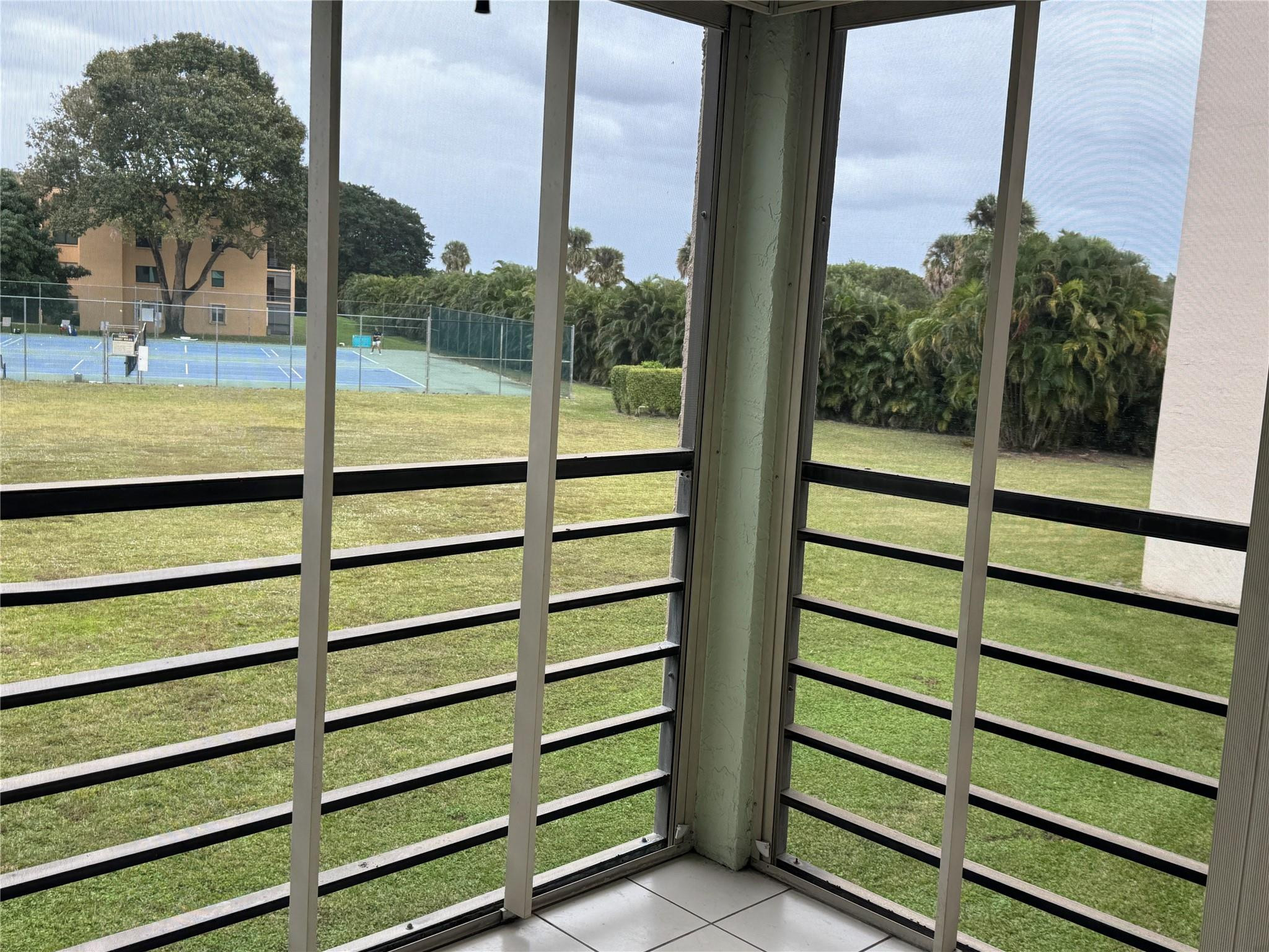 9300 Southwest 8th Street, Unit 215 Boca Raton, FL 33428 - Photo 14 of 43 SCREENED WITH PRIVACY SHUTTERS