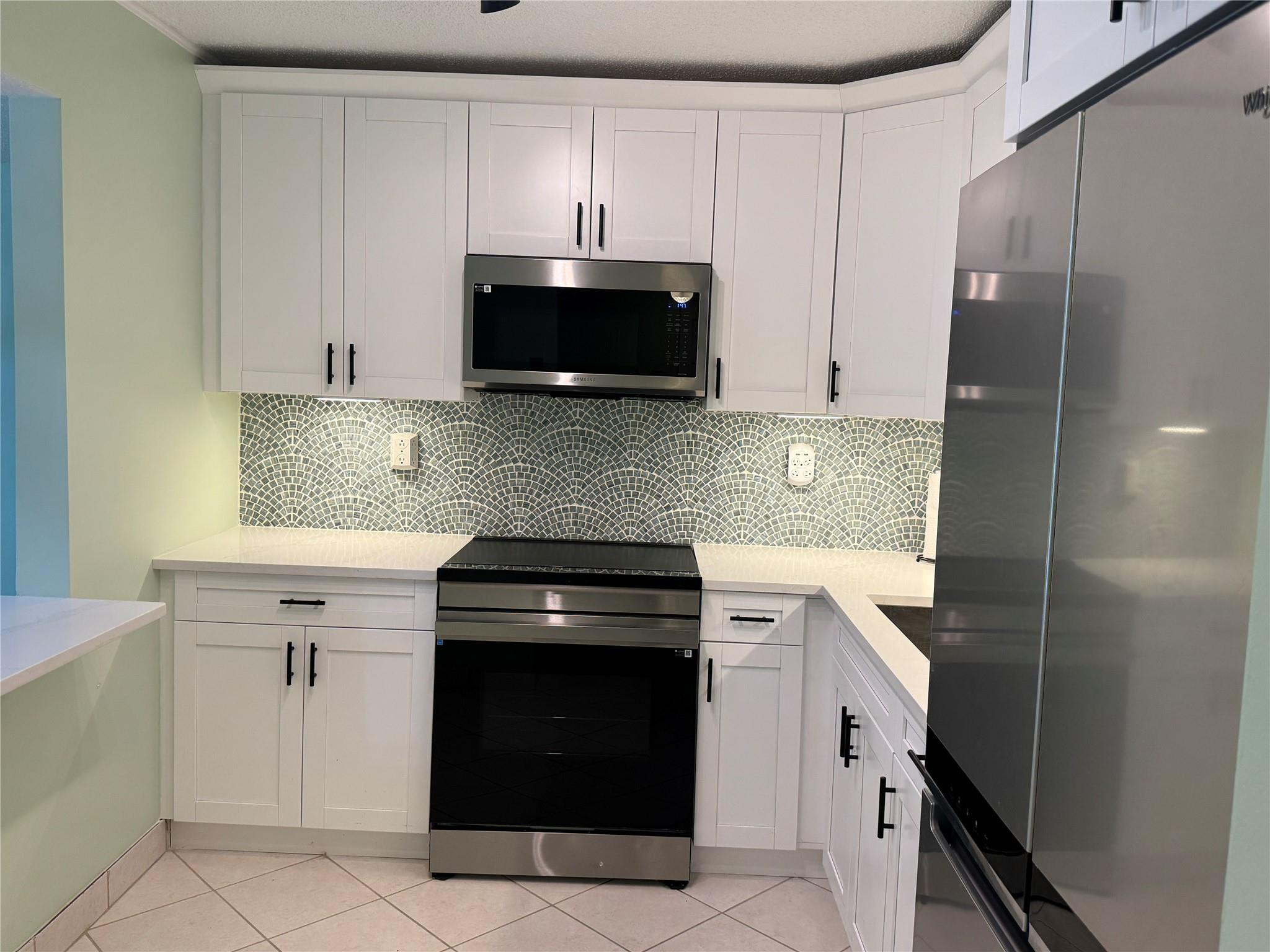 9300 Southwest 8th Street, Unit 215 Boca Raton, FL 33428 - Photo 21 of 43 ALL STAINLESS STEEL APPLIANCES