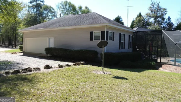 a front view of house with a yard
